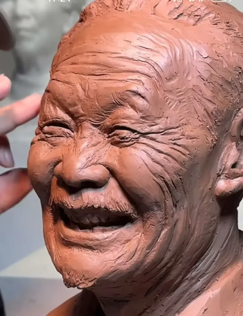 Close-up of the custom memorial bronze bust for an elderly man, highlighting the lifelike smile and weathered features that reflect his warm personality.